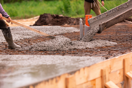 Pouring concrete in the rain